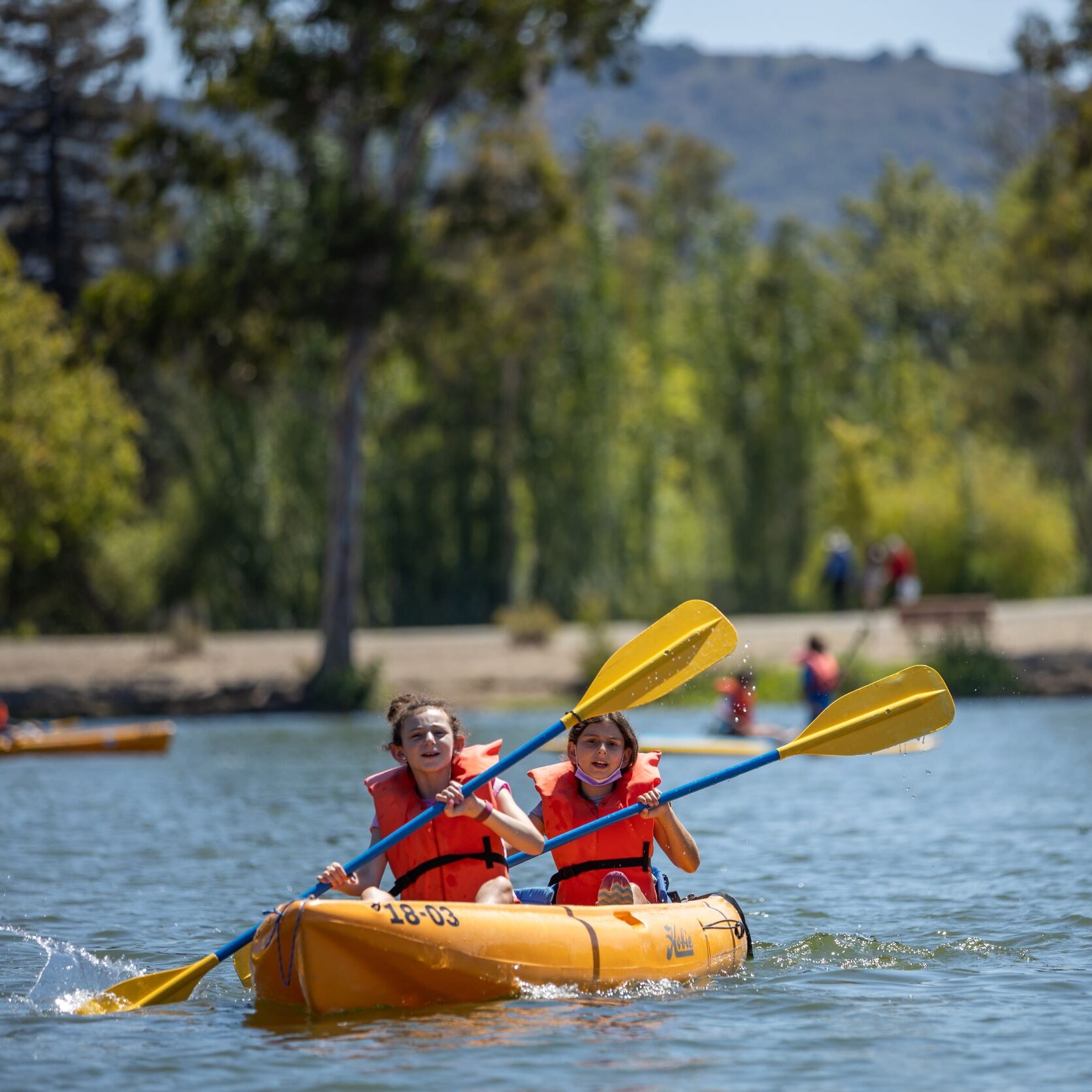 Kids in a kayak on vasona lake