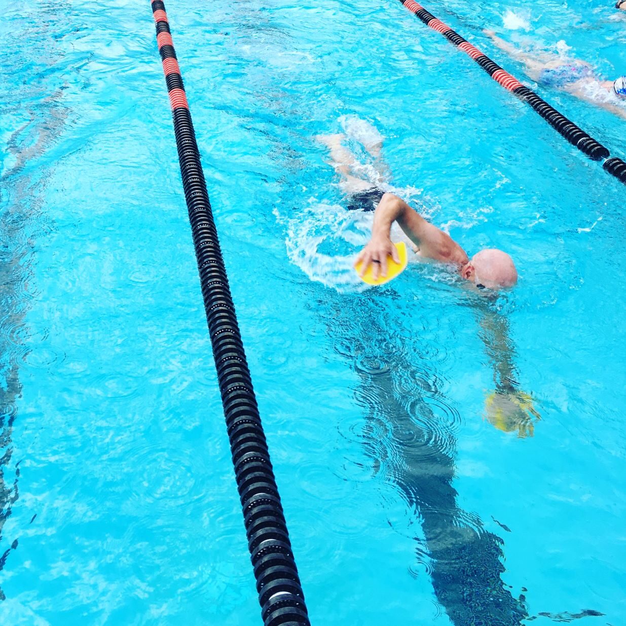 Two people Lap swimming