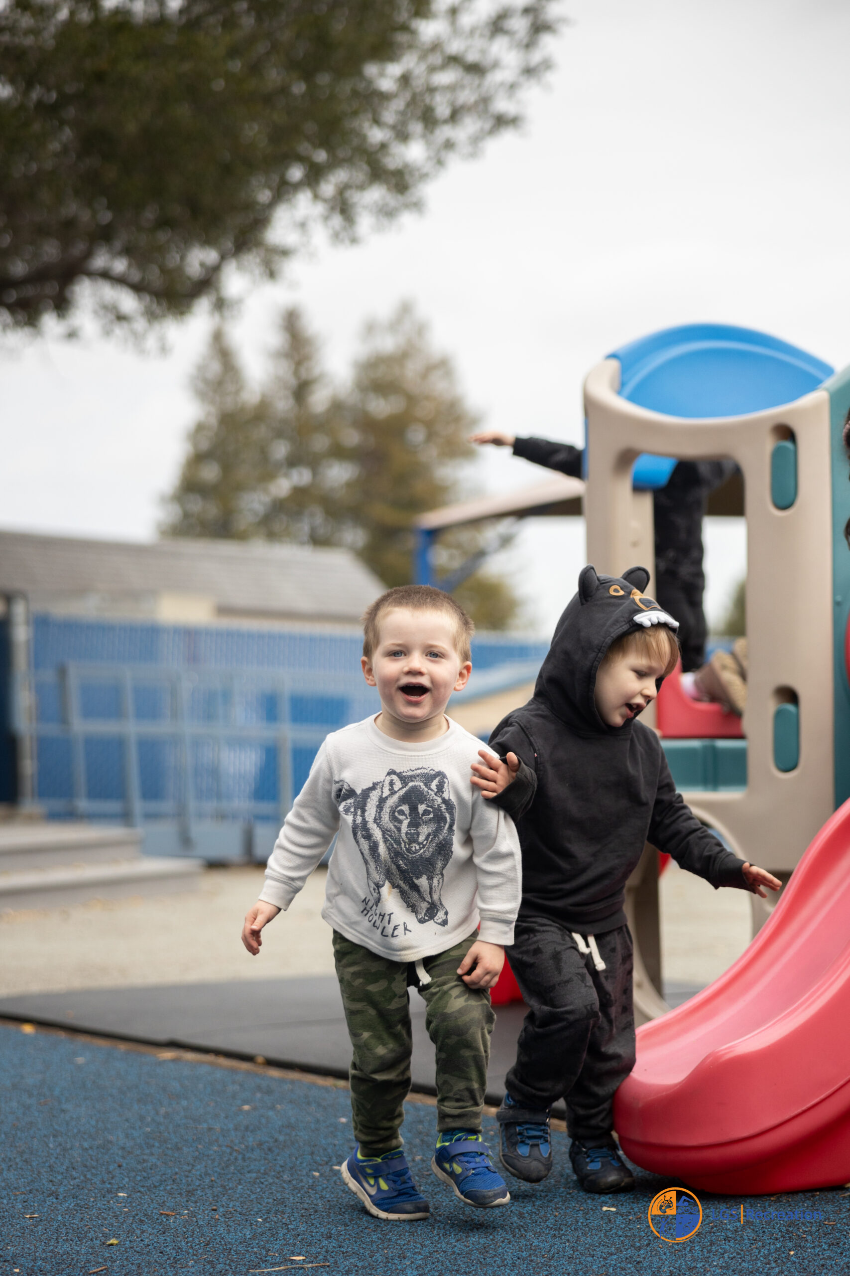 WOD_2-16_Visit-8 preschoolers playing next to a slide