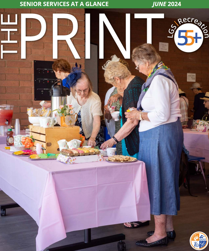 55 plus event, seniors at a dessert table