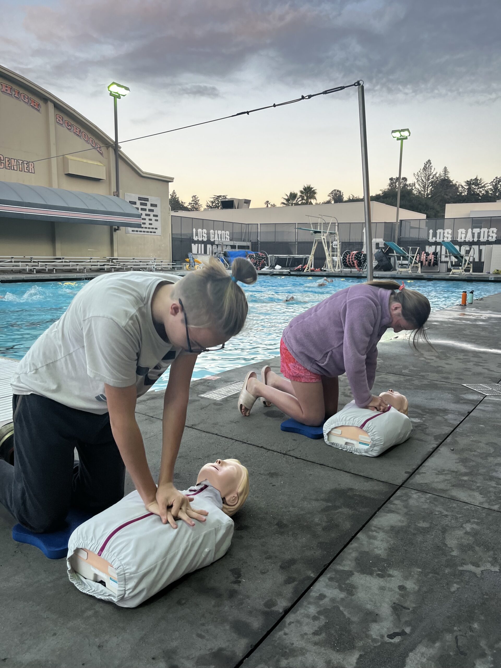 Jr. Guards class doing cpr on dummies