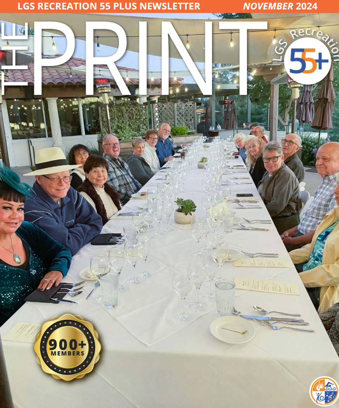 November print cover, seniors at long table at a resturant