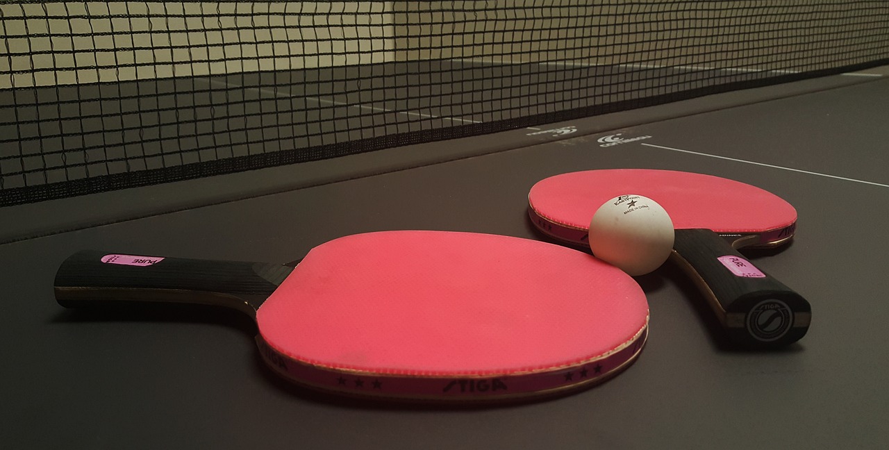 ping pong paddle and ball